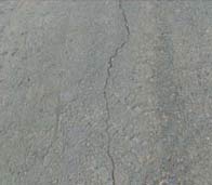 Asphalt pavement crack treatment scheme
